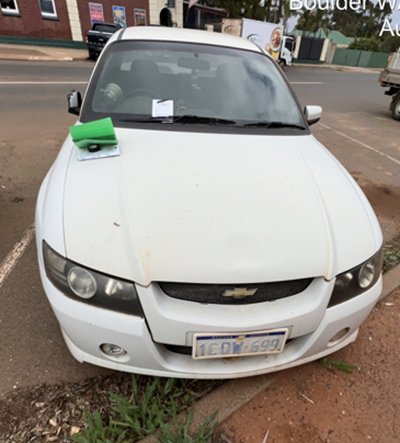 Impounded Vehicle: WHITE HOLDEN Registration: 1COW699