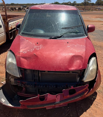 Impounded Vehicle: RED SUZUKI Registration: N/A