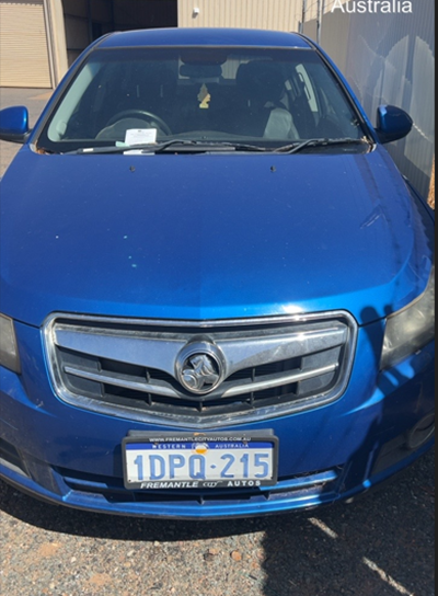 Impounded Vehicle: BLUE HOLDEN Registration: 1DPQ215