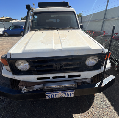 Impounded Vehicle: White TOYOTA Registration: KBC 276P